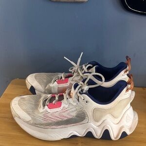 Nike White and Blue Basketball Sneakers with Pink Accents